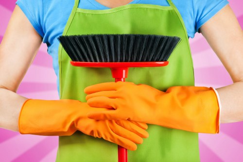 Cleaning dust and debris after renovation in a Belsizepark property