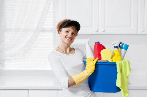 Team using PPE while deep cleaning a property interior