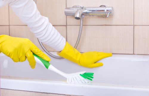 Supervisor reviewing safety procedures before cleaning work